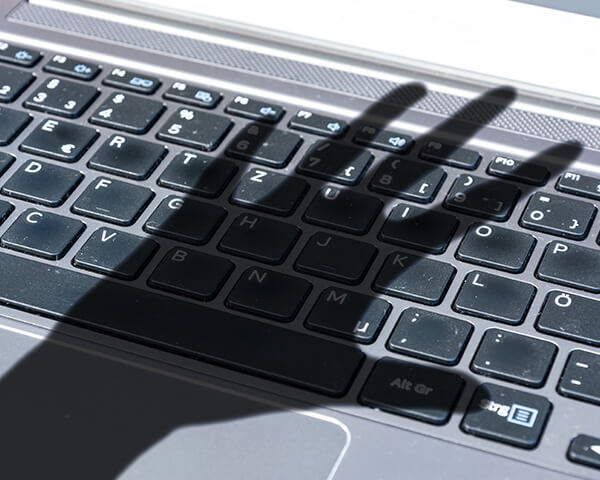 hand shadow on keyboard 