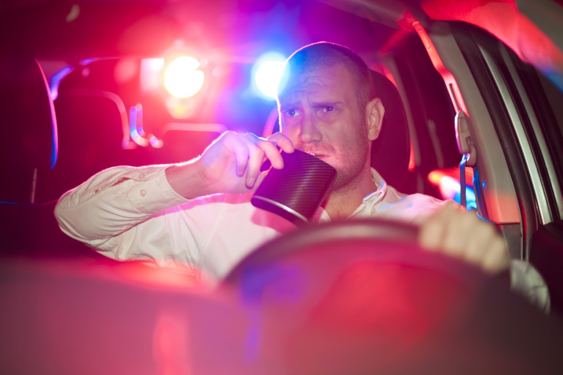 Inspector taking driving test